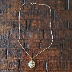 Forever 21 anchor necklace.